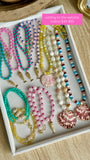 Beaded Necklaces with Shell Pendants